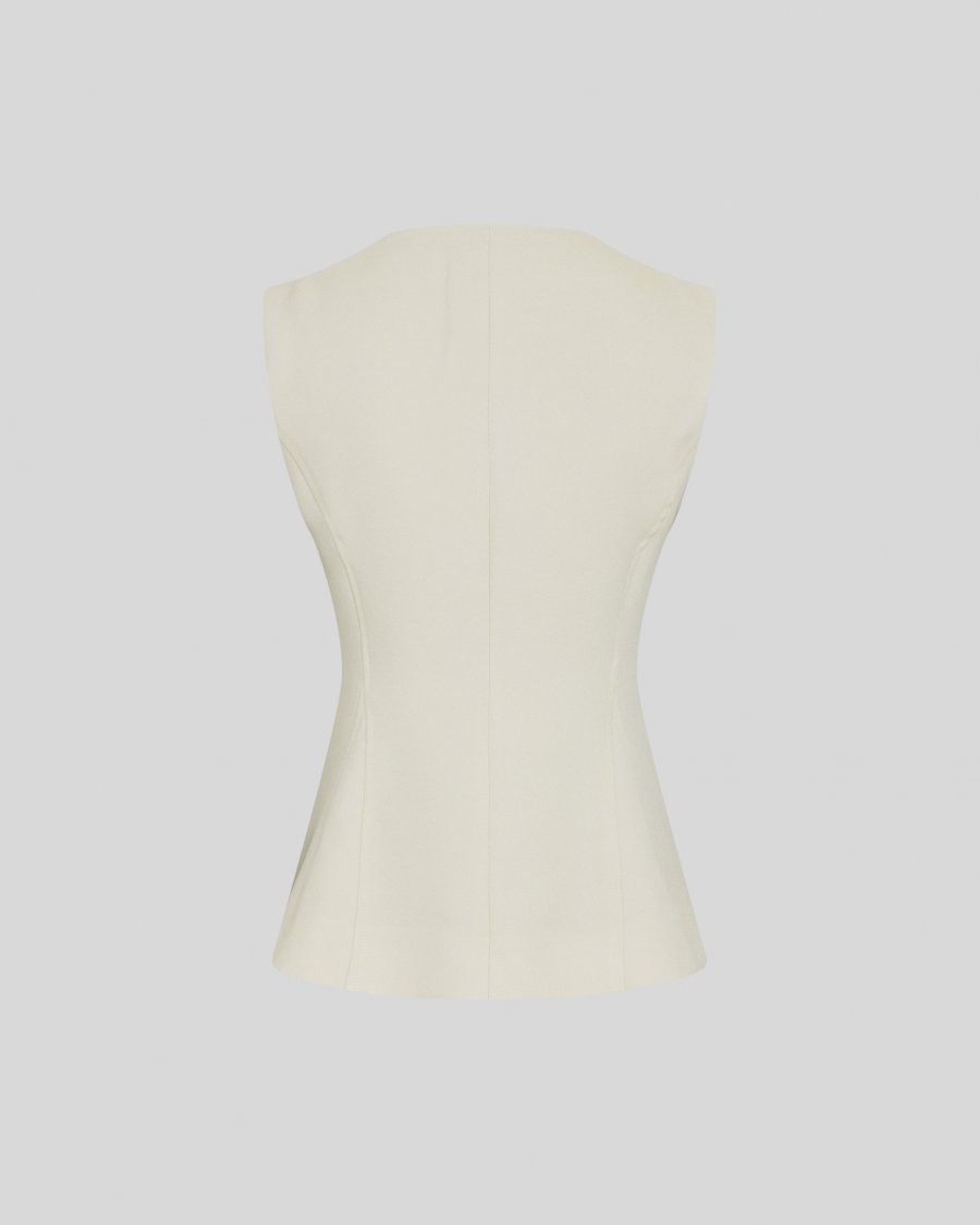 Mannequin torso on a light gray background