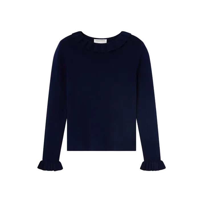 A dark navy blue long-sleeve top with a ruffled collar and matching ruffled cuffs, displayed flat against a light off-white background.